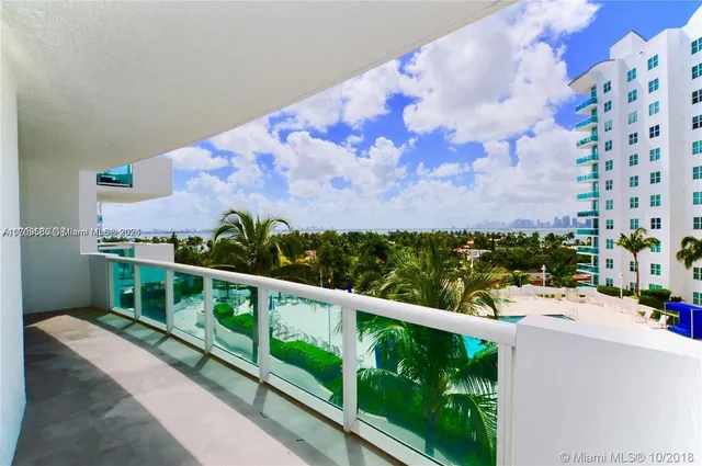 a view of balcony with furniture