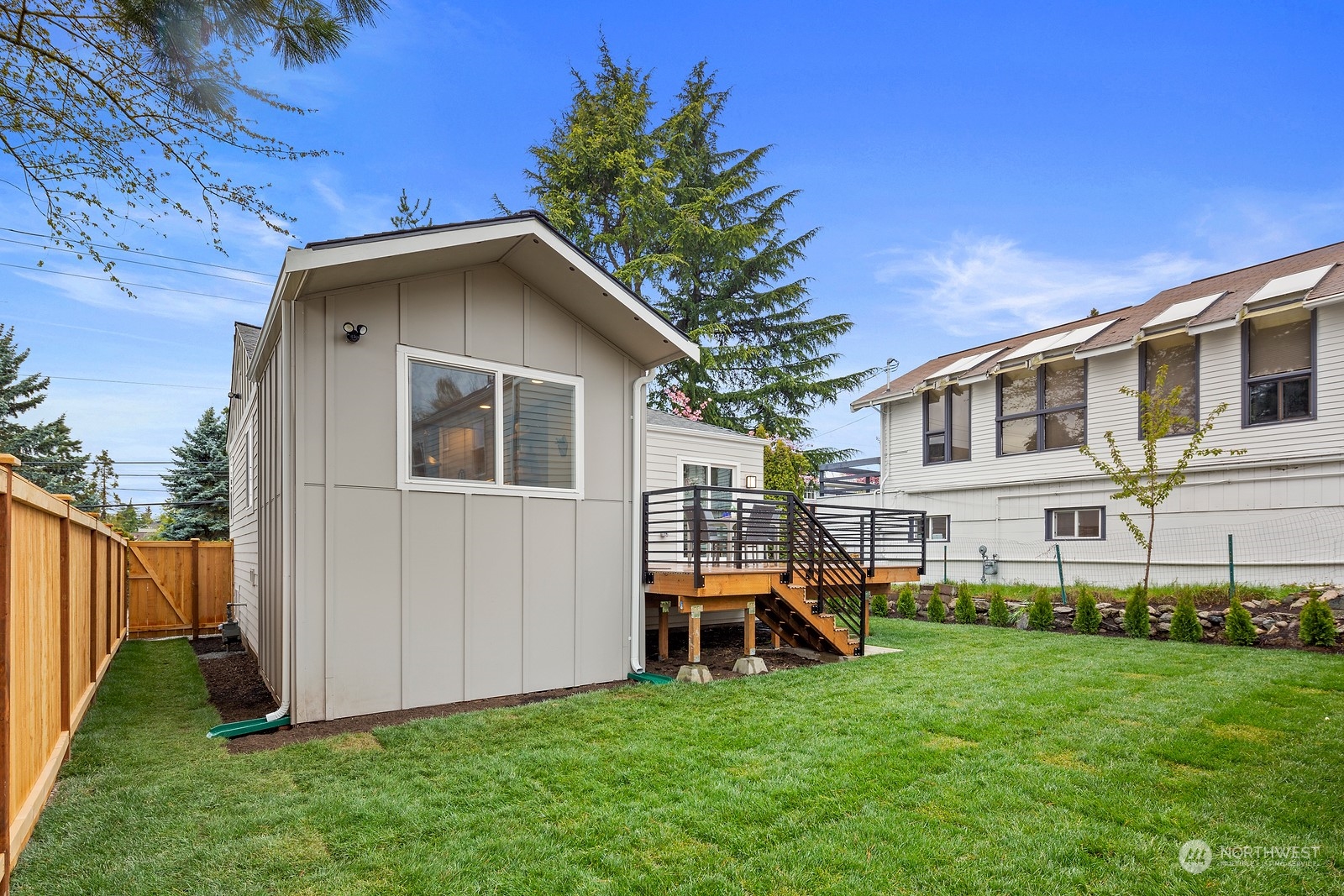 8510 Wallingford Avenue North, Unit A Seattle, WA 98103 - Photo 11 of 36 a house view with a garden space