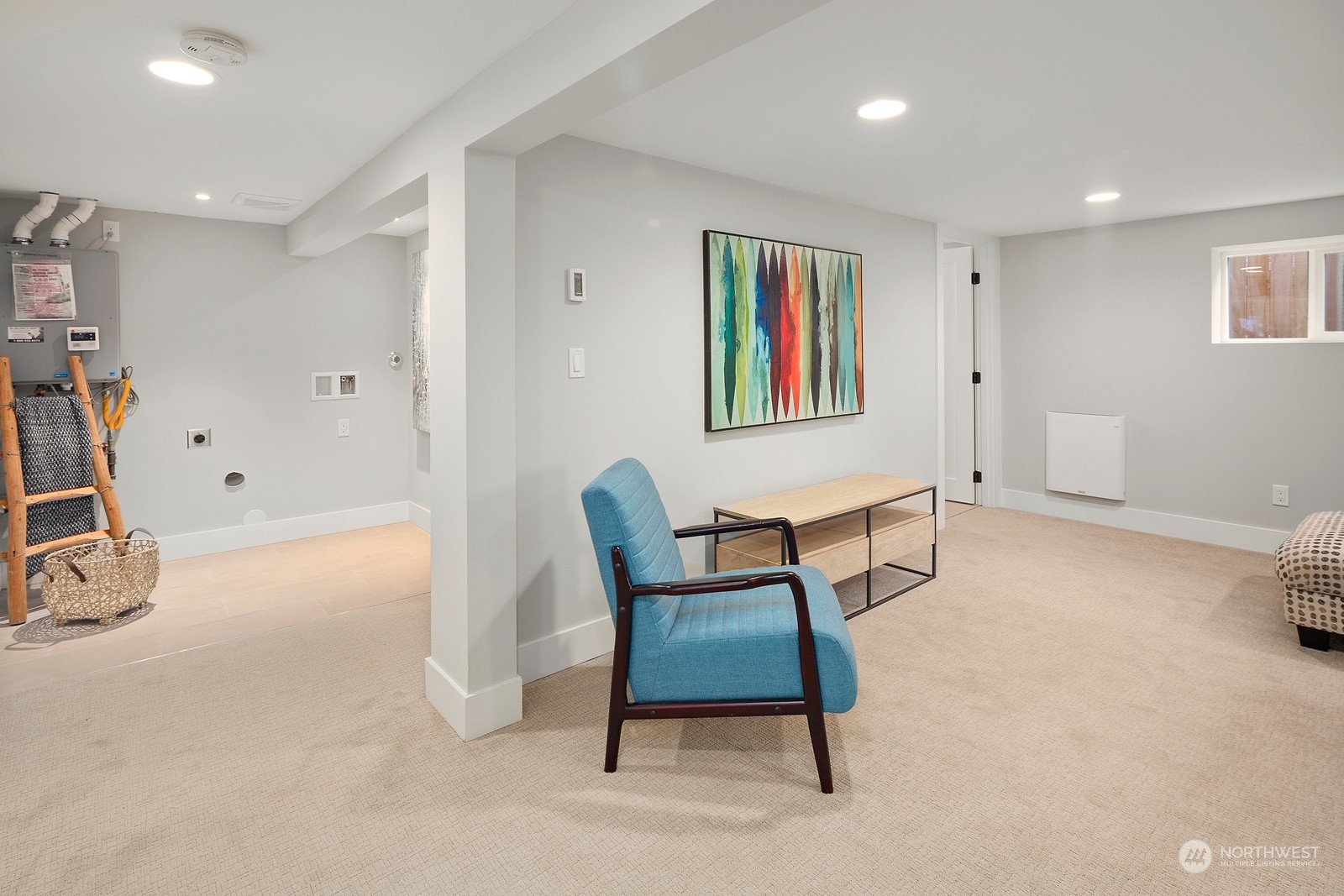 8510 Wallingford Avenue North, Unit A Seattle, WA 98103 - Photo 21 of 36 a view of a livingroom with furniture