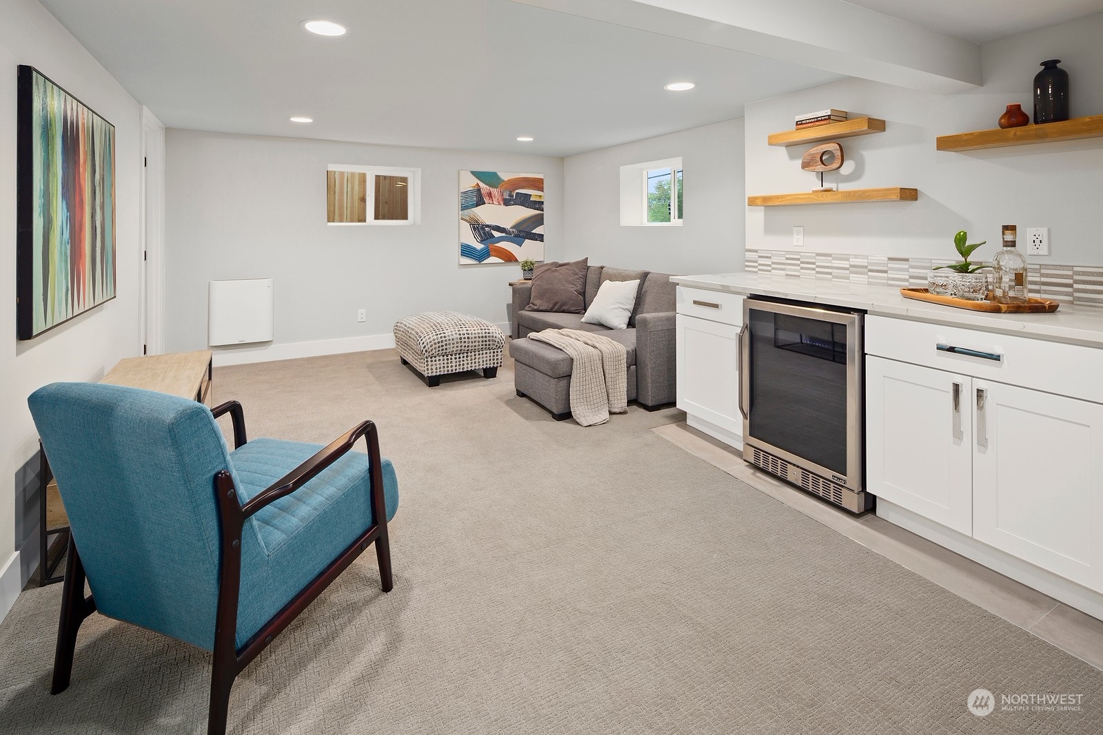 8510 Wallingford Avenue North, Unit A Seattle, WA 98103 - Photo 22 of 36 a living room with furniture and a couch