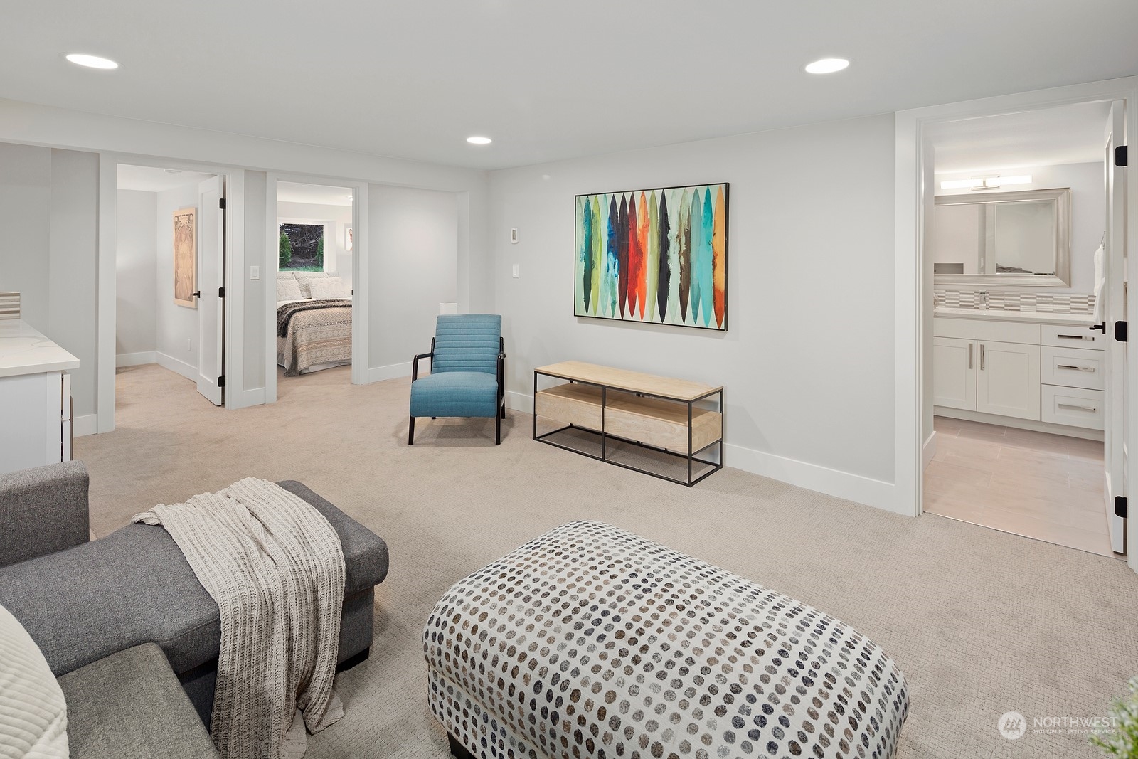 8510 Wallingford Avenue North, Unit A Seattle, WA 98103 - Photo 24 of 36 a bedroom with furniture and a window