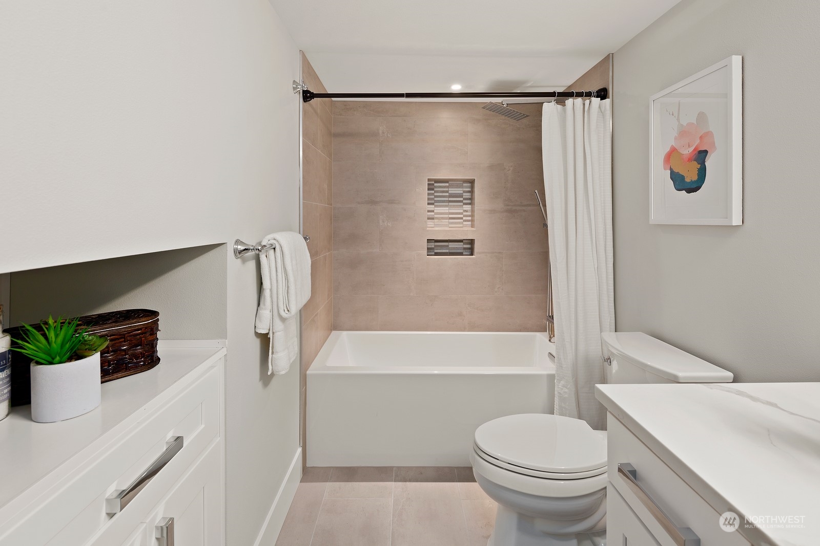 8510 Wallingford Avenue North, Unit A Seattle, WA 98103 - Photo 30 of 36 a bathroom with a sink toilet and shower