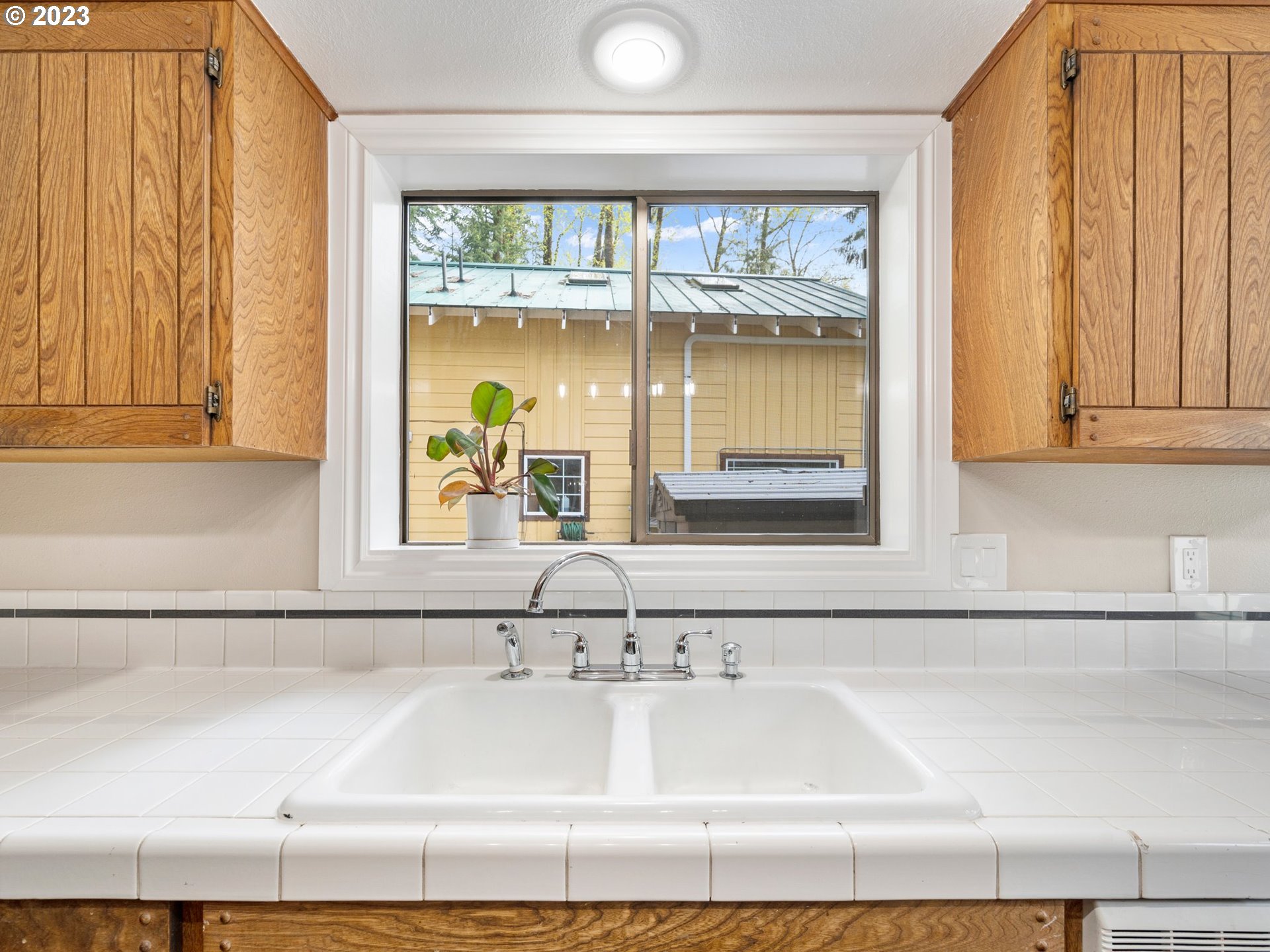 65353 East Timberline Drive Rhododendron, OR 97049 - Photo 15 of 34 a bathroom with a bathtub and a window