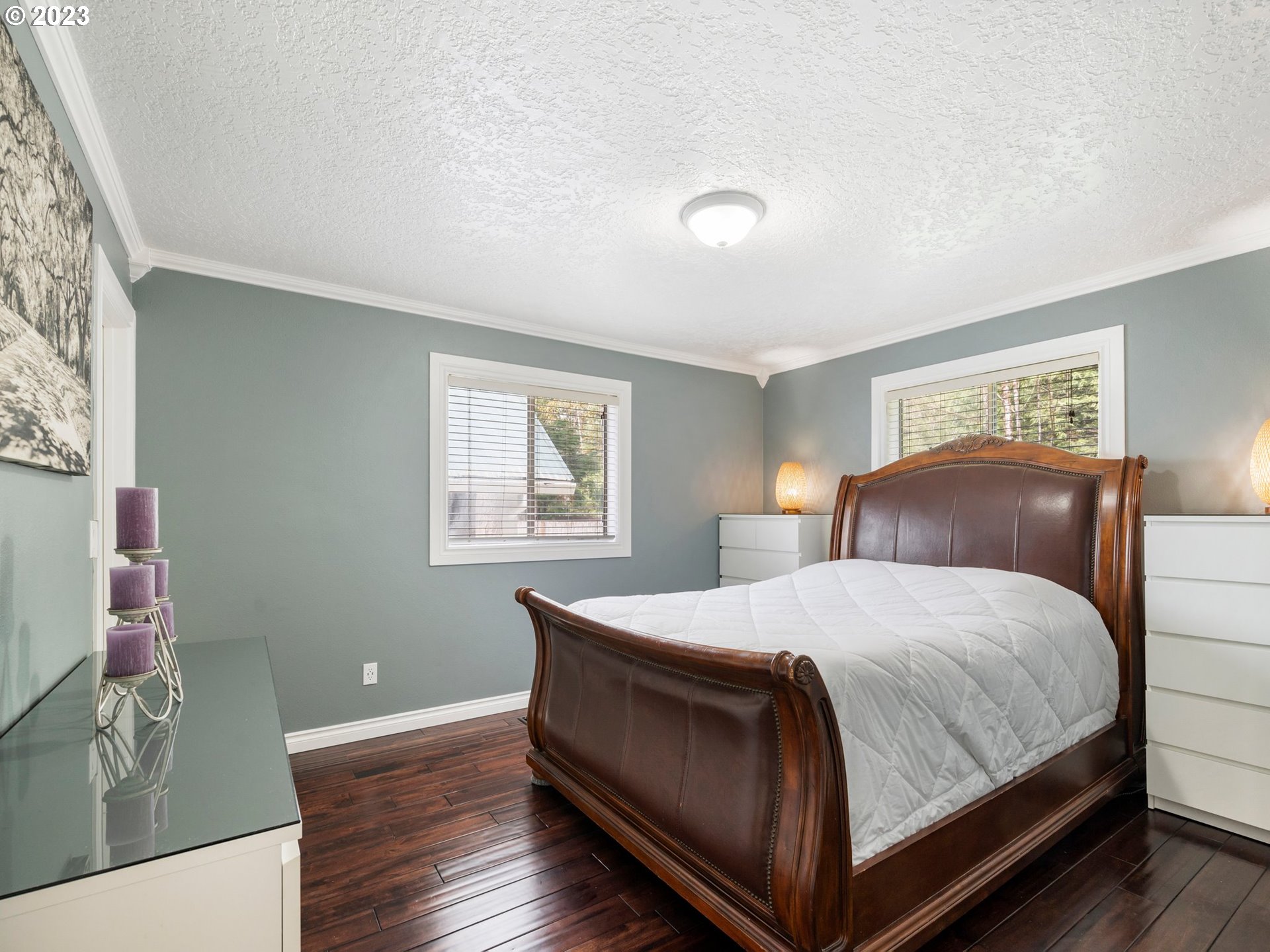 65353 East Timberline Drive Rhododendron, OR 97049 - Photo 16 of 34 a bedroom with a bed and wooden floor