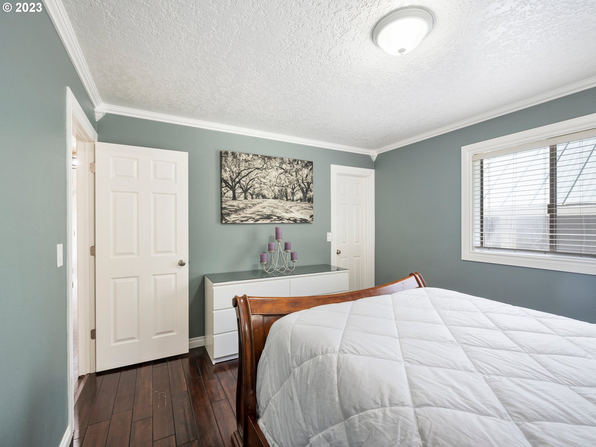 65353 East Timberline Drive Rhododendron, OR 97049 - Photo 17 of 34 a bedroom with a bed and a window