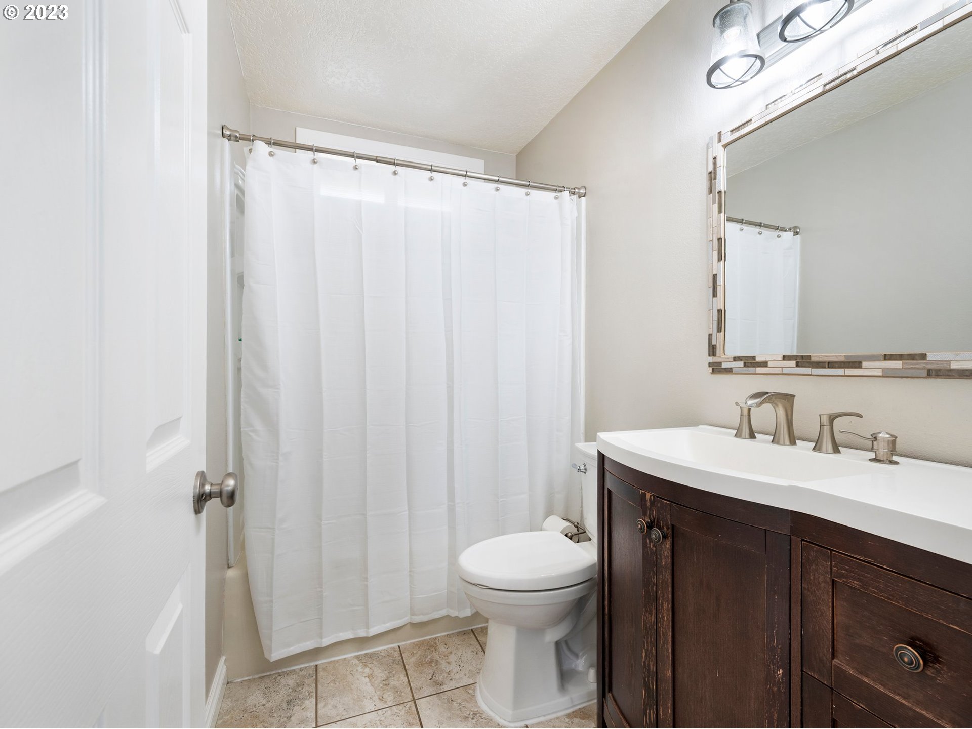 65353 East Timberline Drive Rhododendron, OR 97049 - Photo 18 of 34 a bathroom with a sink a toilet and shower