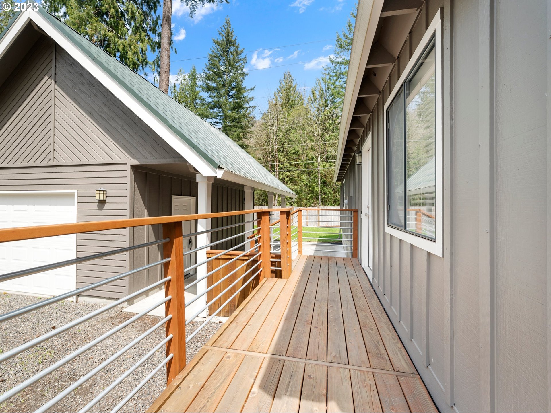 65353 East Timberline Drive Rhododendron, OR 97049 - Photo 23 of 34 a view of balcony with wooden floor and fence