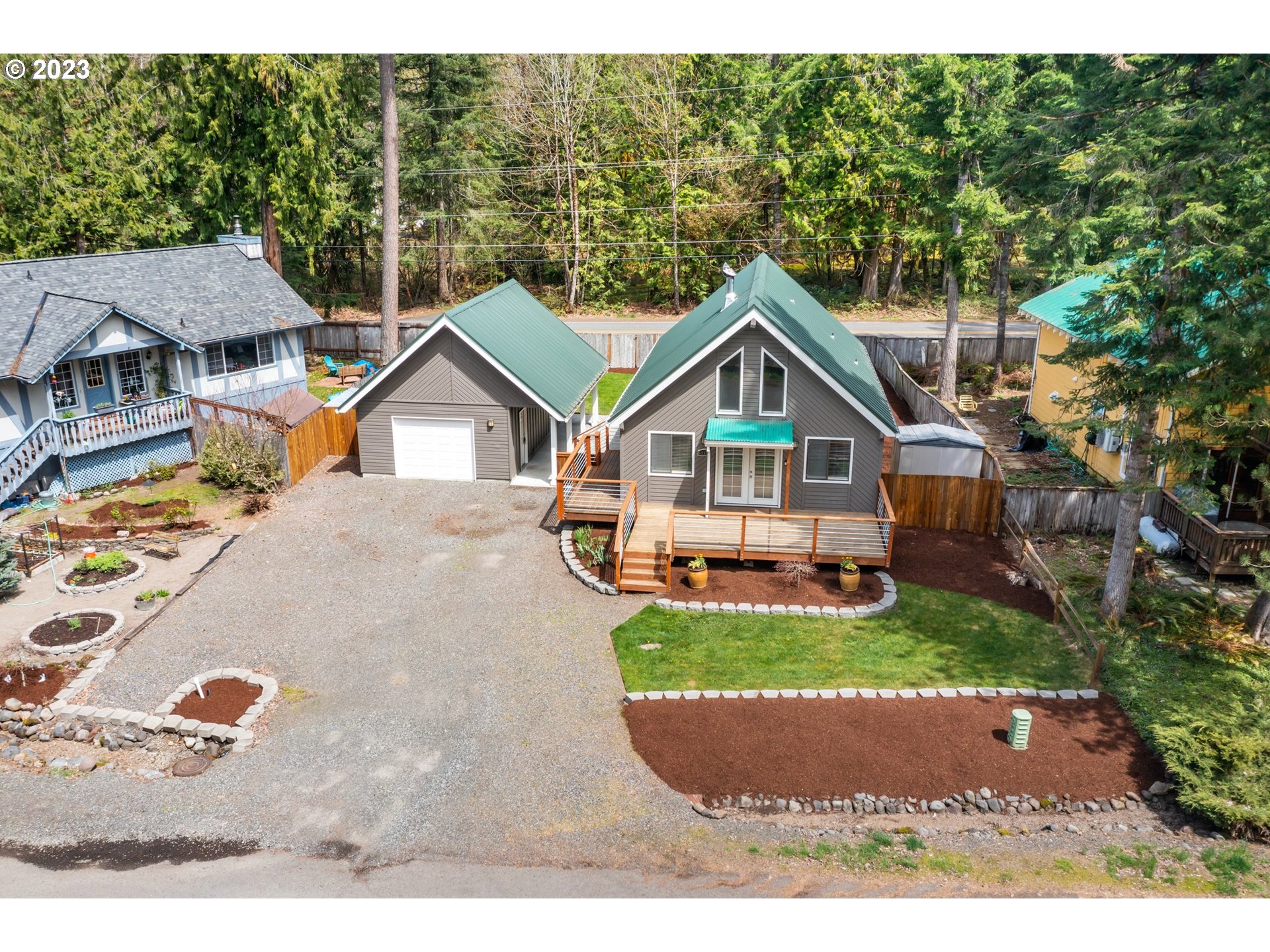 65353 East Timberline Drive Rhododendron, OR 97049 - Photo 31 of 34 a view of house with backyard and garden