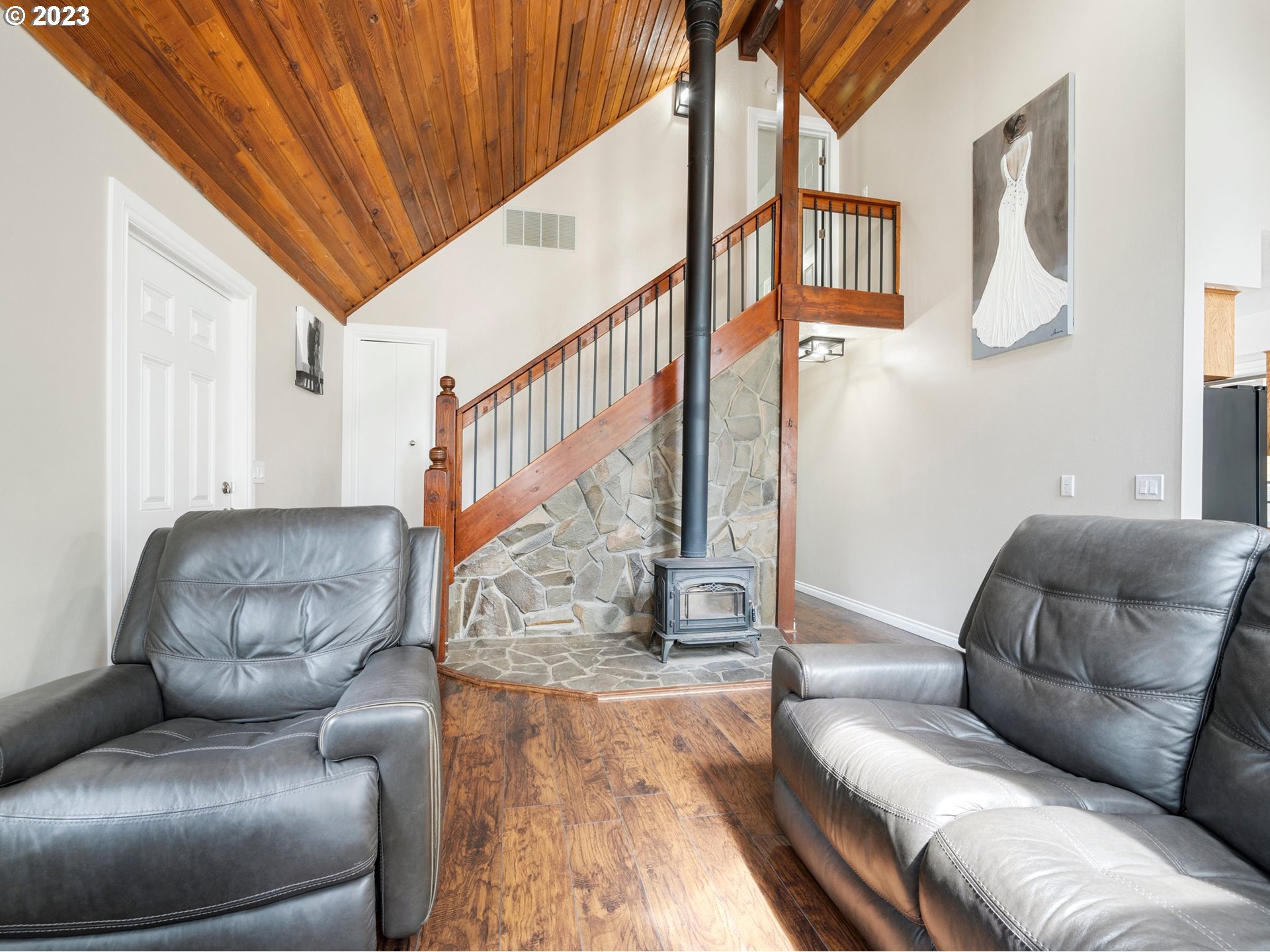 65353 East Timberline Drive Rhododendron, OR 97049 - Photo 9 of 34 a living room with furniture and stairs