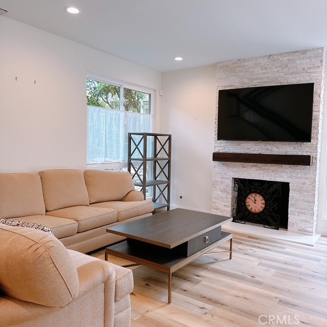 4 Canyon Ridge Irvine, CA 92603 - Photo 3 of 17 Living room with fireplace