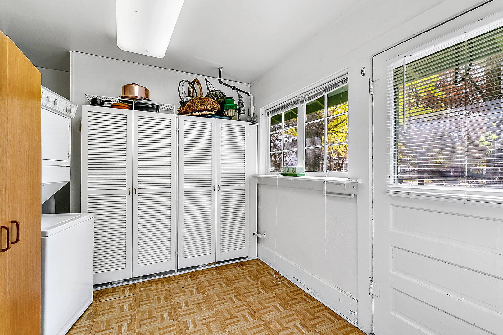 128 Barrypoint Road Riverside, IL 60546 - Photo 13 of 27 a view of a livingroom with wooden floor and windows