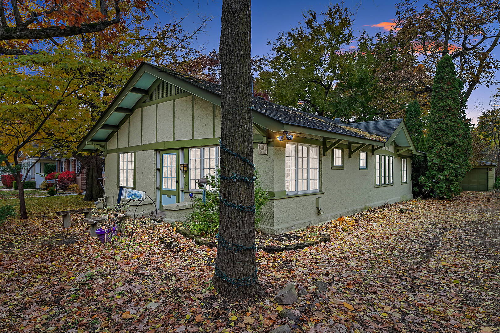 128 Barrypoint Road Riverside, IL 60546 - Photo 17 of 27 a front view of a house with a yard and tree