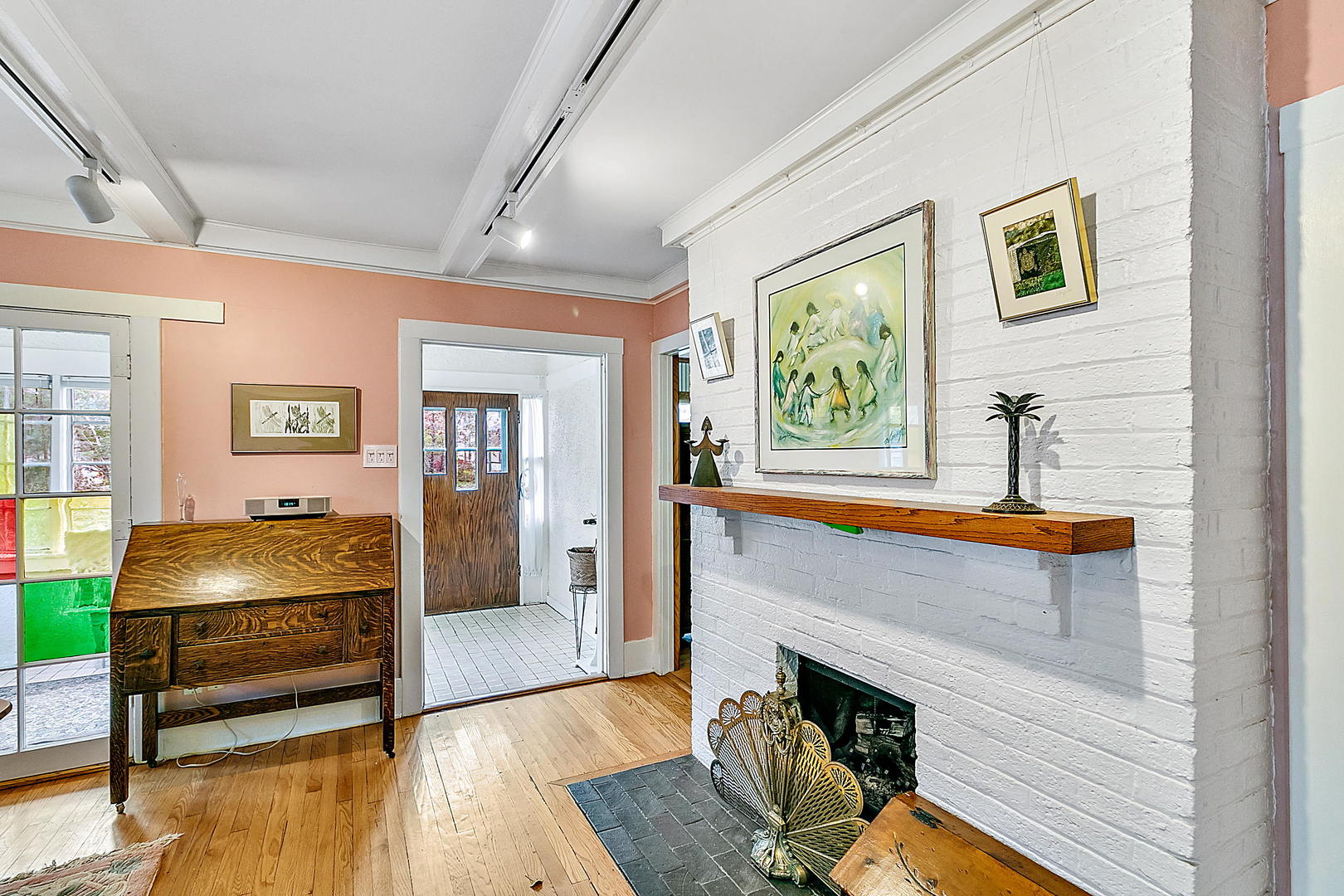128 Barrypoint Road Riverside, IL 60546 - Photo 2 of 27 a living room with furniture and a fireplace