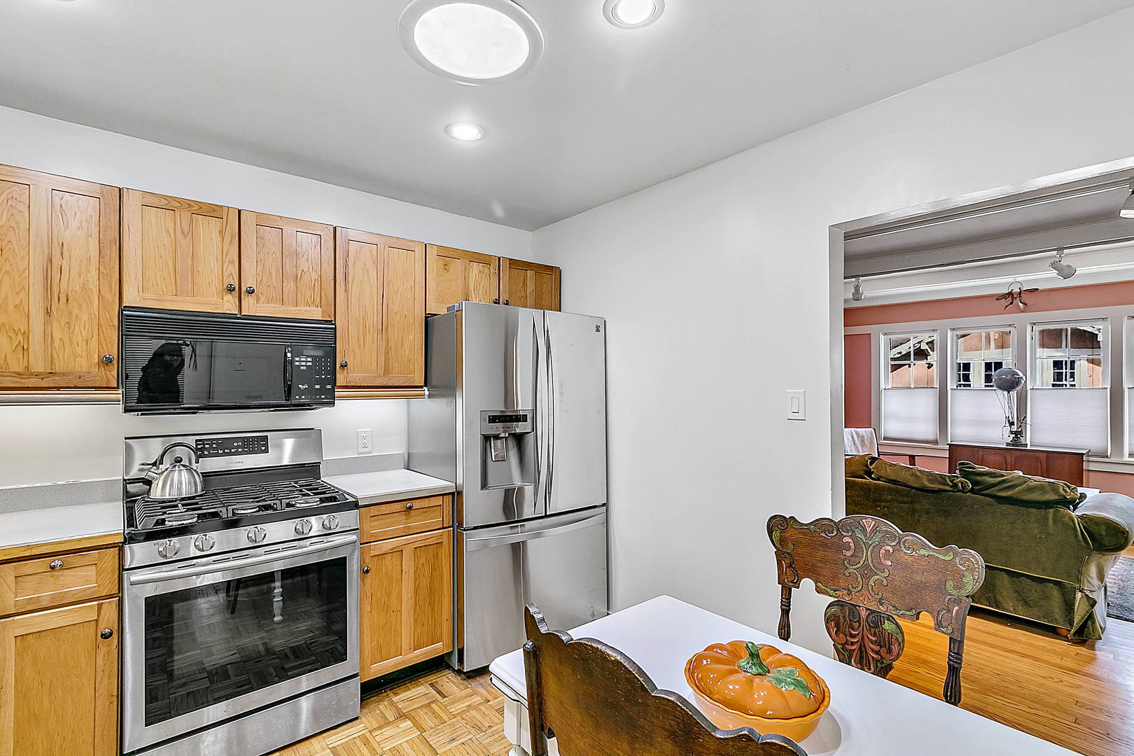 128 Barrypoint Road Riverside, IL 60546 - Photo 6 of 27 a kitchen with stainless steel appliances granite countertop a refrigerator stove microwave and sink