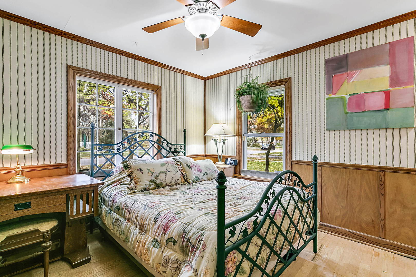 128 Barrypoint Road Riverside, IL 60546 - Photo 8 of 27 a bedroom with a bed and a chandelier