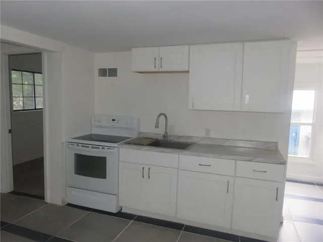 $105,000 | 4421 Northeast Winn Road, Kansas City, MO 64117