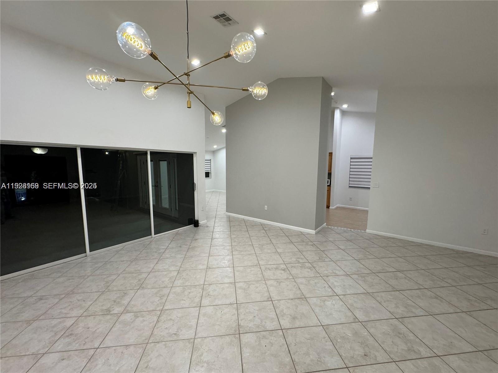 8965 Southwest 59th Court Cooper City, FL 33328 - Photo 24 of 34 a view of an empty room with a bathroom