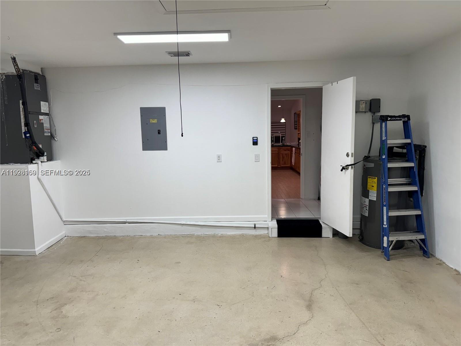 8965 Southwest 59th Court Cooper City, FL 33328 - Photo 31 of 34 a view of an empty room with closet and a window