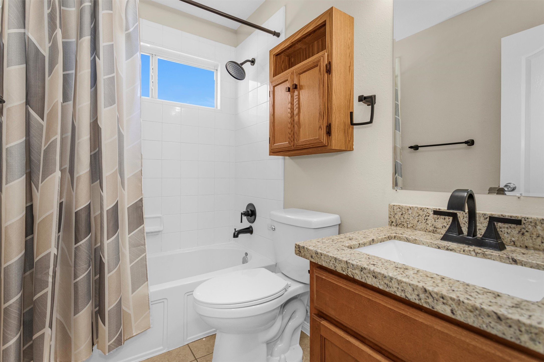29710 Legends Ranch Court Spring, TX 77386 - Photo 18 of 20 a bathroom with a granite countertop sink toilet and shower