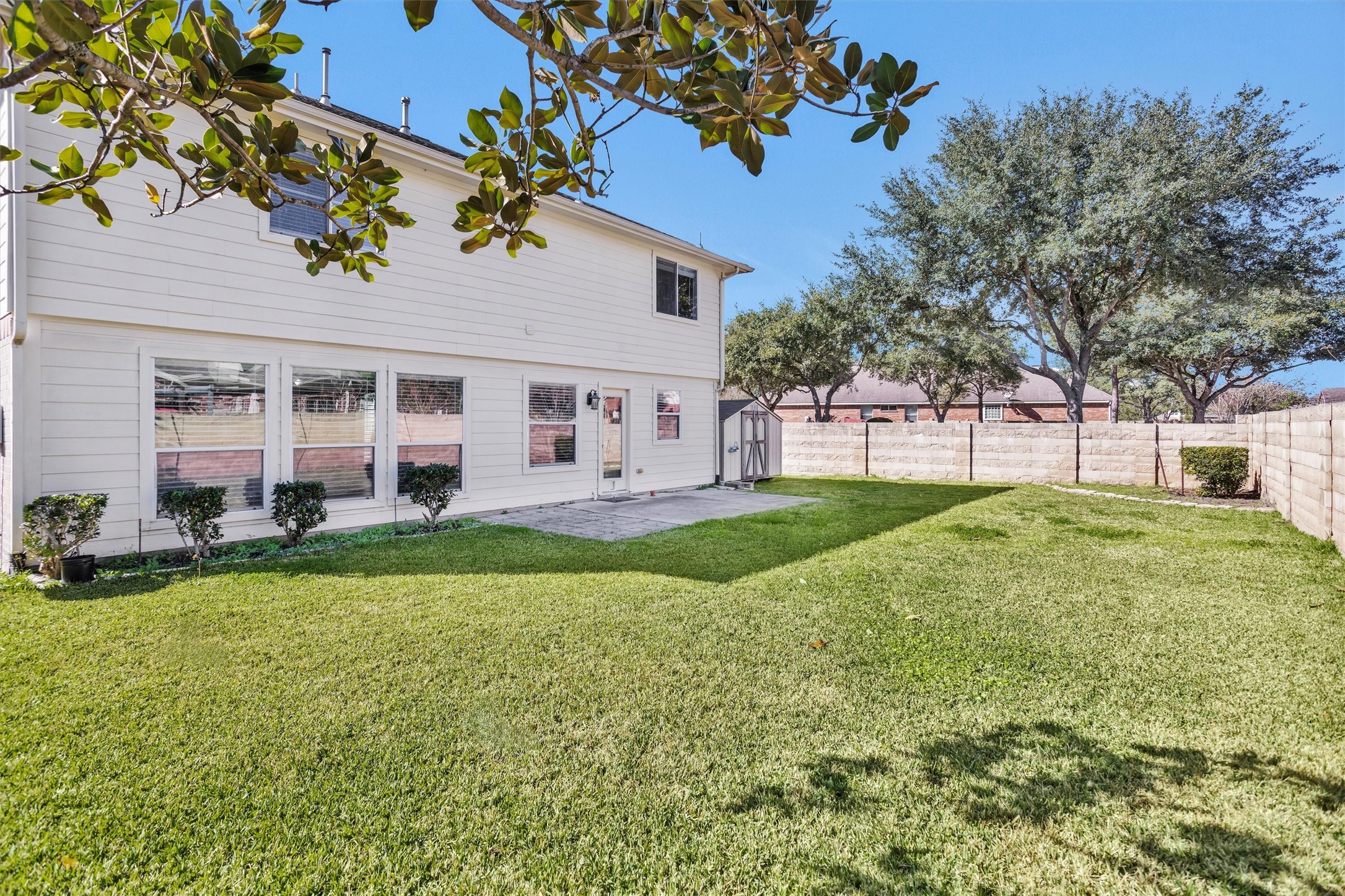 29710 Legends Ranch Court Spring, TX 77386 - Photo 20 of 20 a view of a house with a backyard porch and sitting area