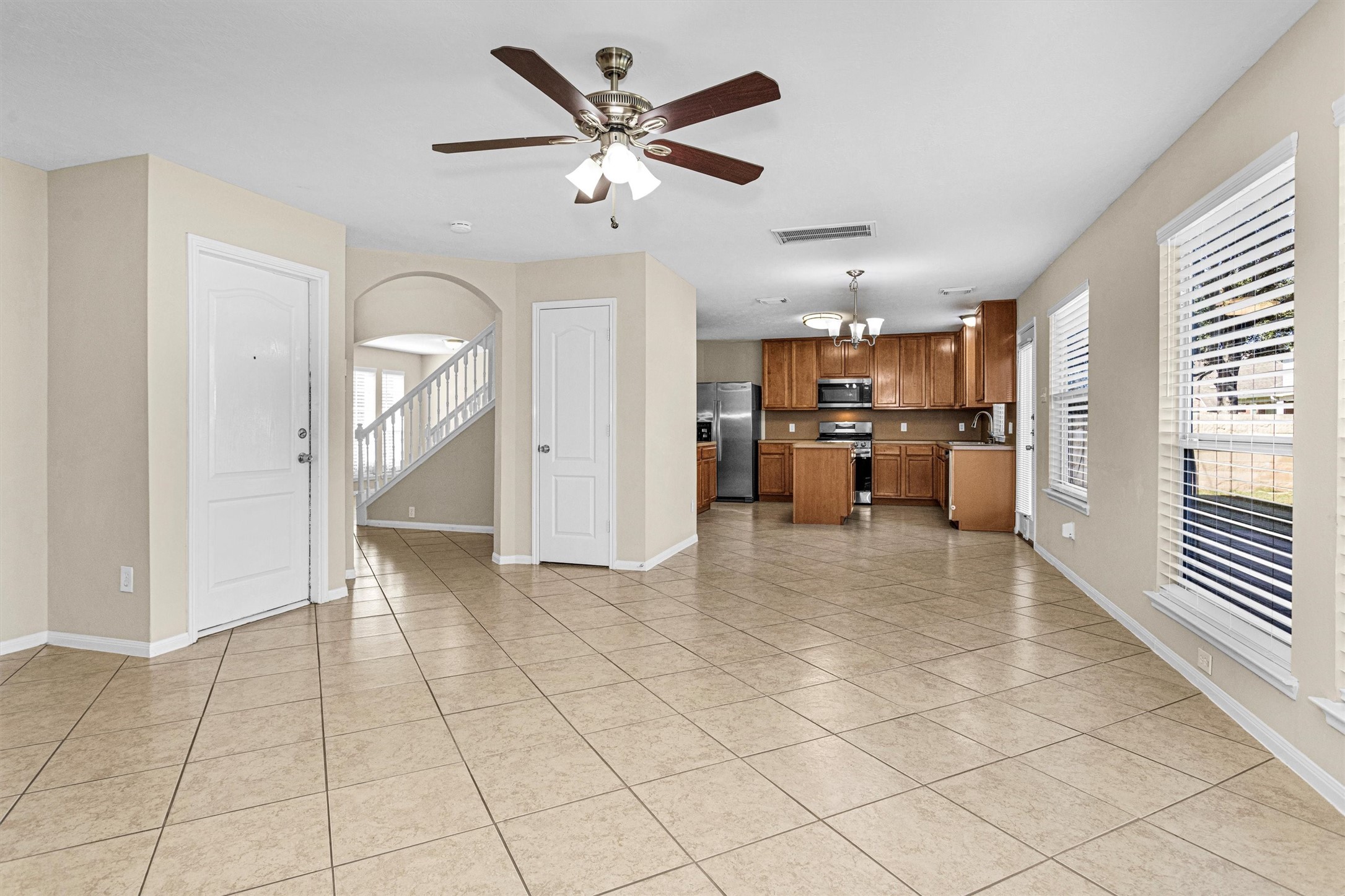 29710 Legends Ranch Court Spring, TX 77386 - Photo 9 of 20 a view of a livingroom with furniture and a stove top oven