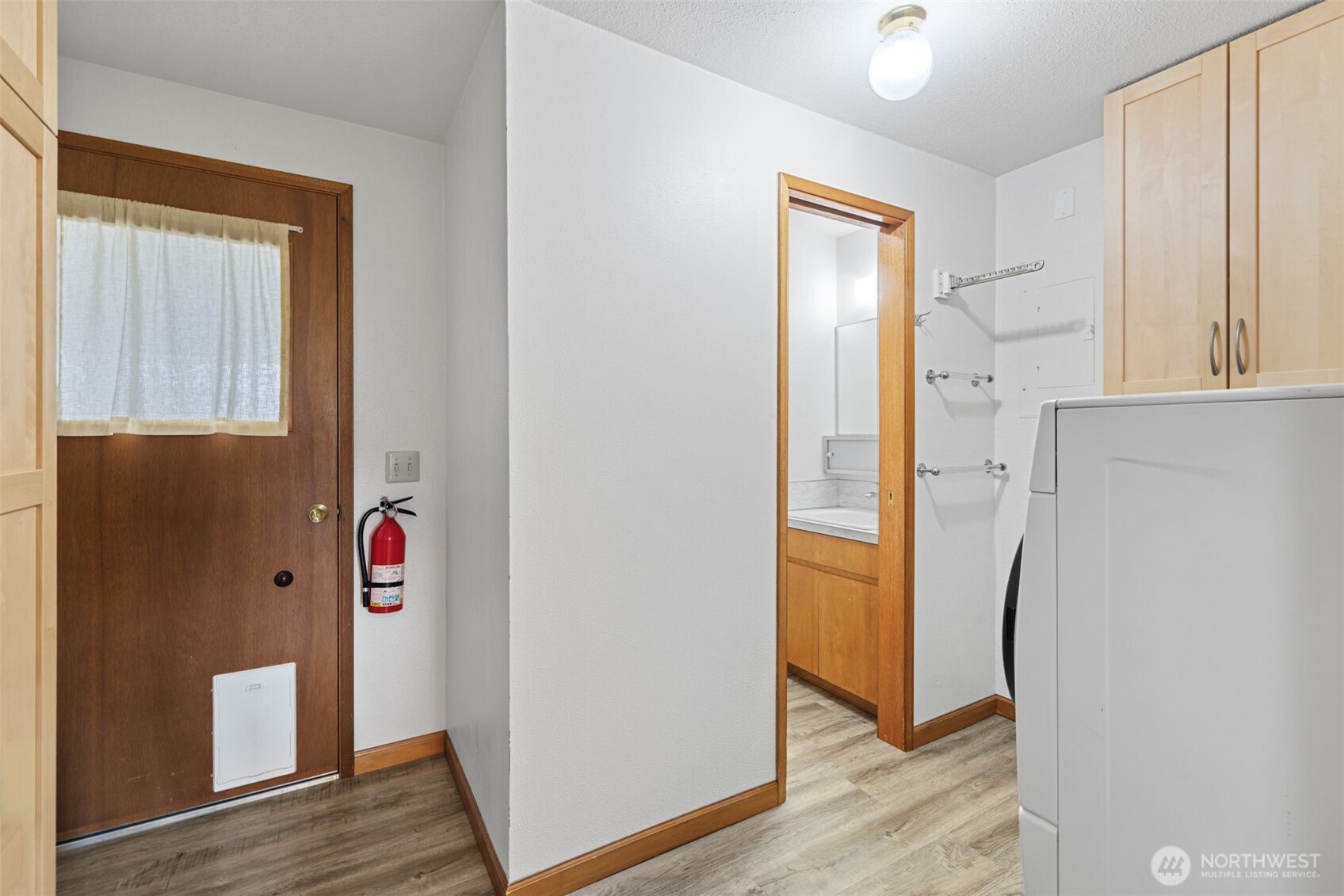 1301 South 3rd Avenue, Unit 28A Sequim, WA 98382 - Photo 22 of 40 a view of hallway with wooden floor