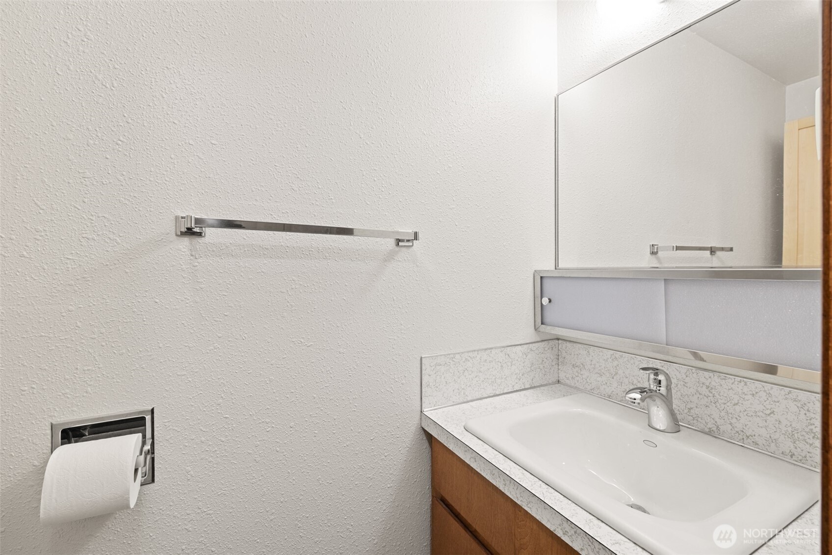 1301 South 3rd Avenue, Unit 28A Sequim, WA 98382 - Photo 24 of 40 a bathroom with a sink and a mirror