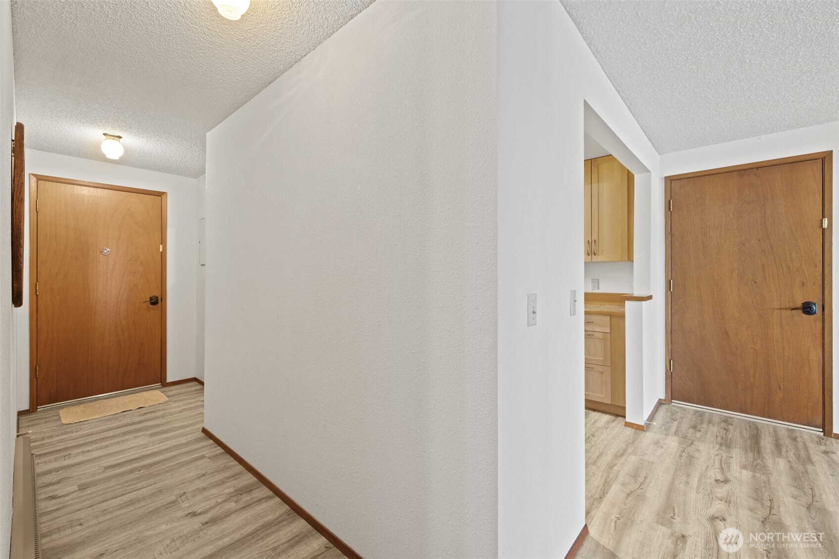 1301 South 3rd Avenue, Unit 28A Sequim, WA 98382 - Photo 28 of 40 a view of hallway with wooden floor