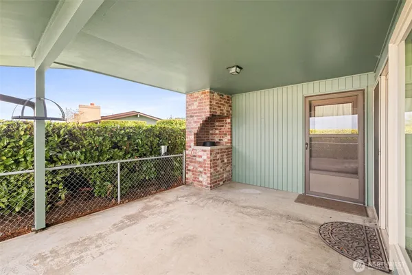 a balcony with chairs