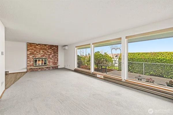 a view of a big room with large windows