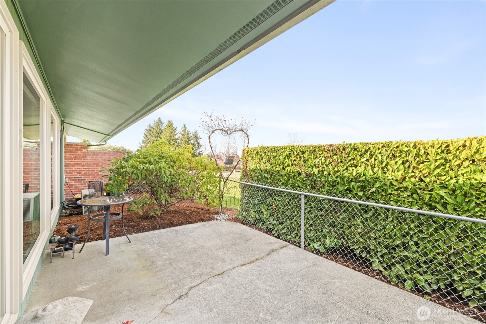 1301 South 3rd Avenue, Unit 28A Sequim, WA 98382 - Photo 31 of 40 a balcony with chairs