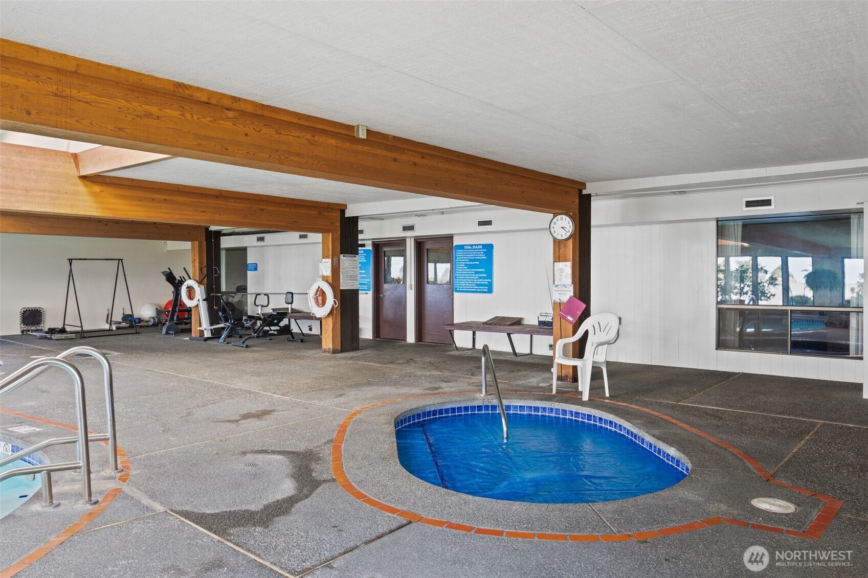 1301 South 3rd Avenue, Unit 28A Sequim, WA 98382 - Photo 39 of 40 a room with gym equipment and a large window