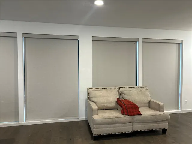 a living room with furniture and a couch