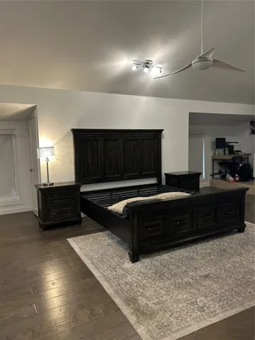 a living room with a couch and a dresser