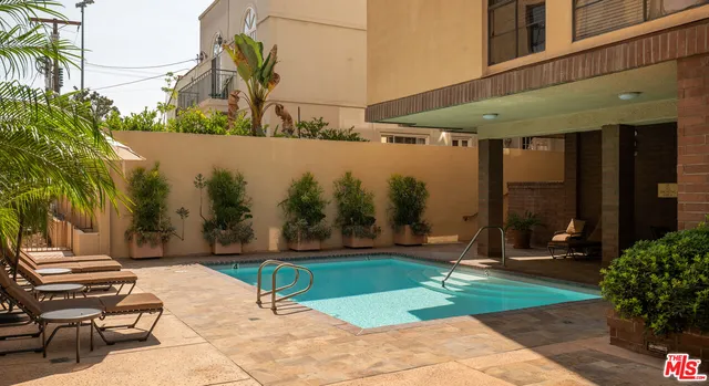 a garden view with a seating space