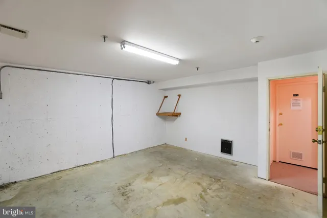 a view of a room with an empty space