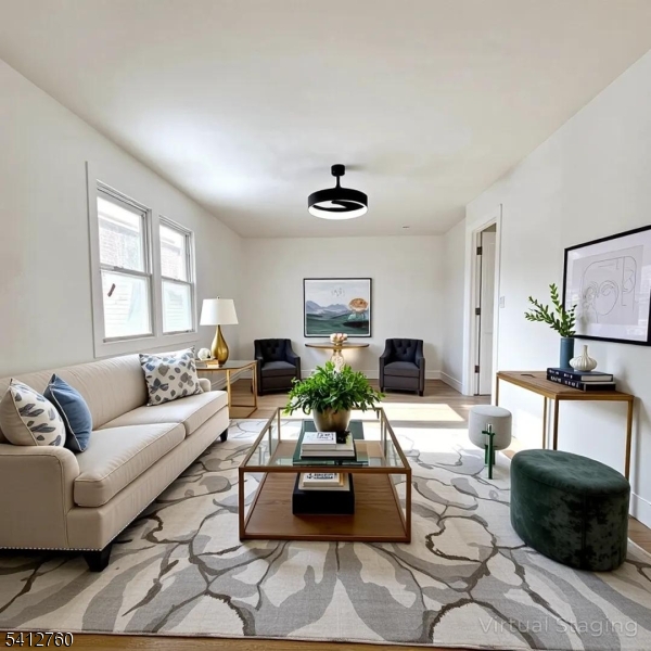 8 Berry Street, Unit 2 Dover, NJ 07801 - Photo 11 of 19 a living room with furniture and a window