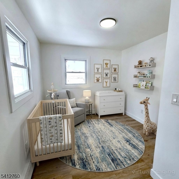 8 Berry Street, Unit 2 Dover, NJ 07801 - Photo 3 of 19 a living room with furniture and a window