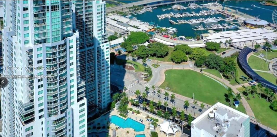 253 Northeast 2nd Street, Unit 905 Miami, FL 33132 - Photo 13 of 20 an aerial view of a residential apartment building with a yard and plants