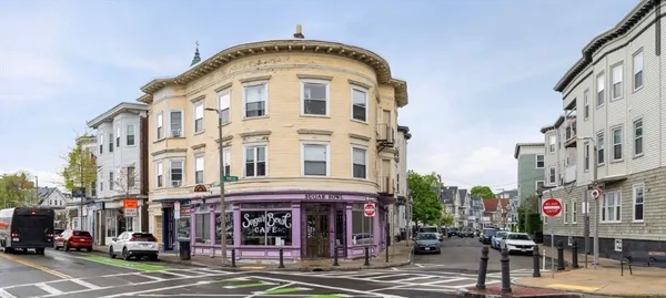 a view of a building with a street