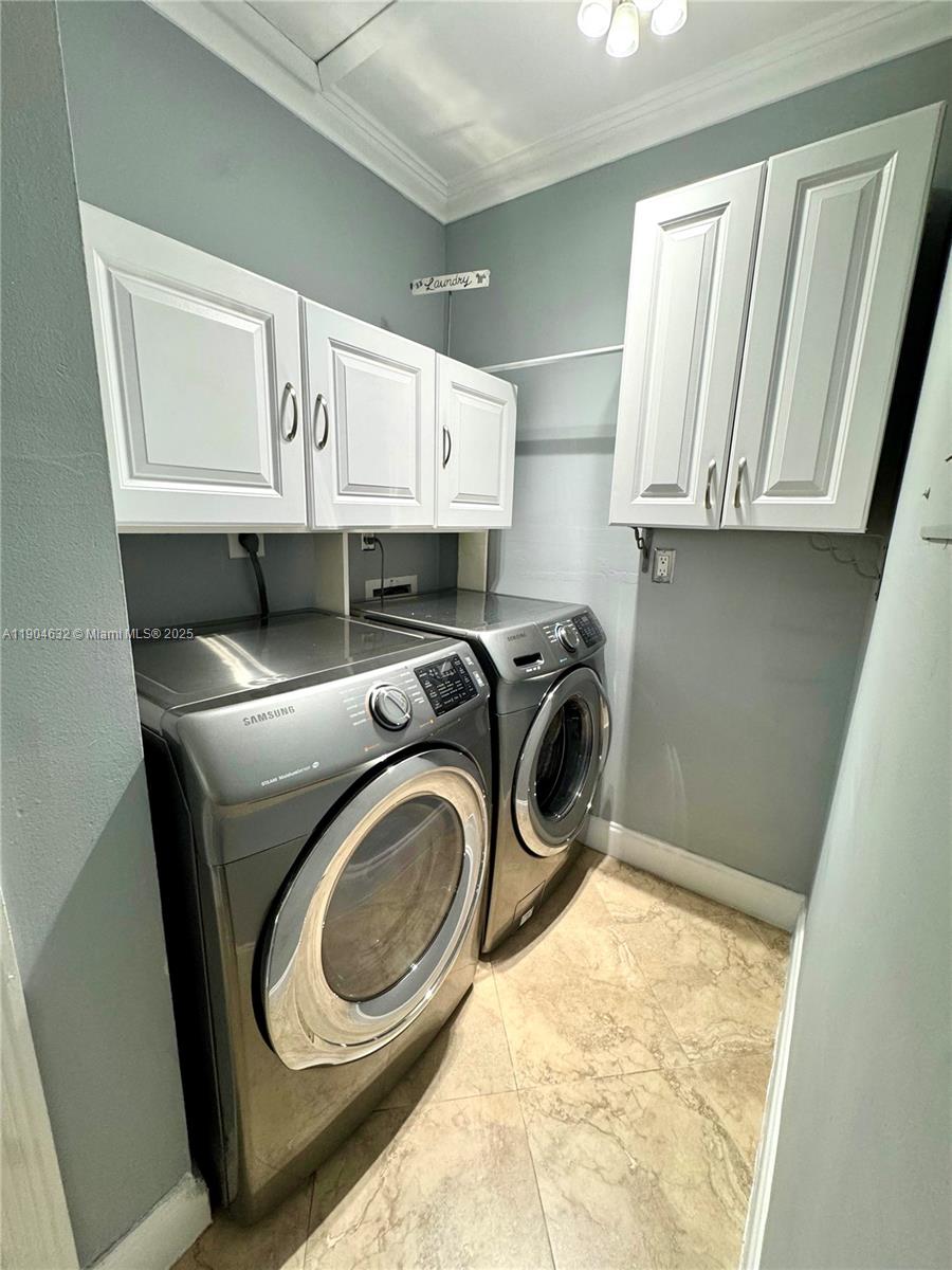 7870 West 29th Way, Unit 201 Hialeah, FL 33018 - Photo 18 of 18 a utility room with sink washer and dryer