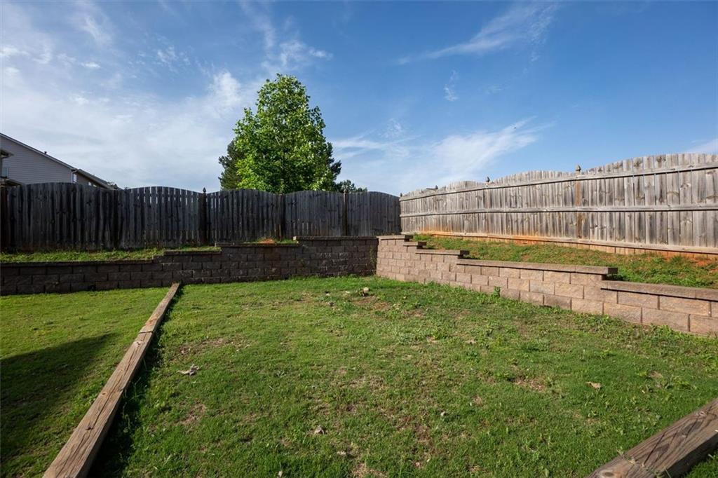 9120 Alden Drive Locust Grove, GA 30248 - Photo 15 of 39 a view of a backyard