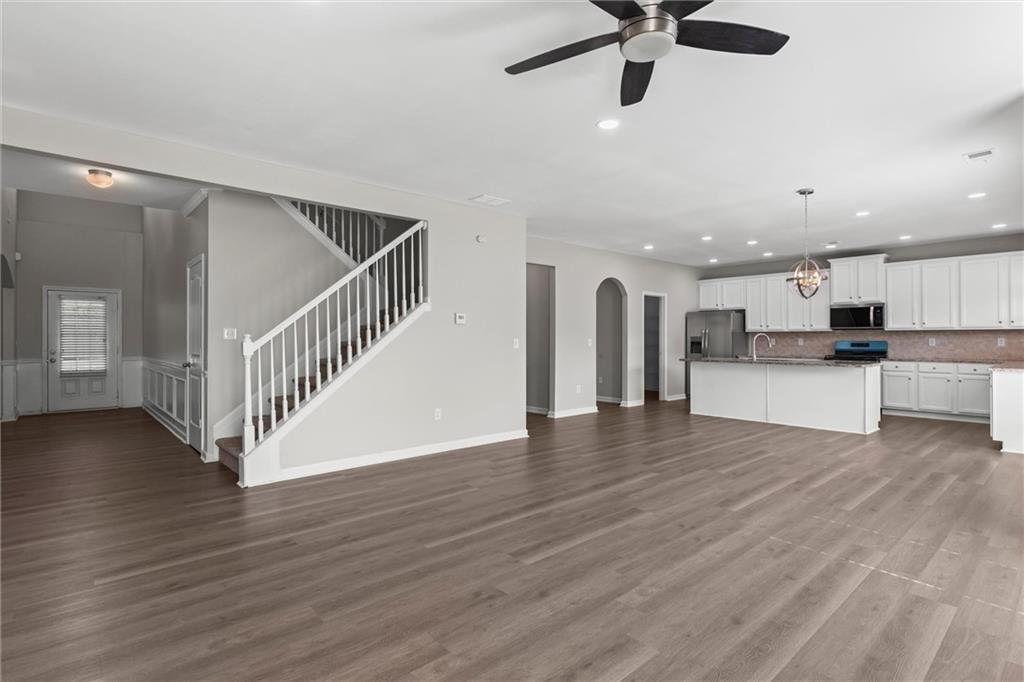 9120 Alden Drive Locust Grove, GA 30248 - Photo 18 of 39 a view of kitchen with sink and wooden floor