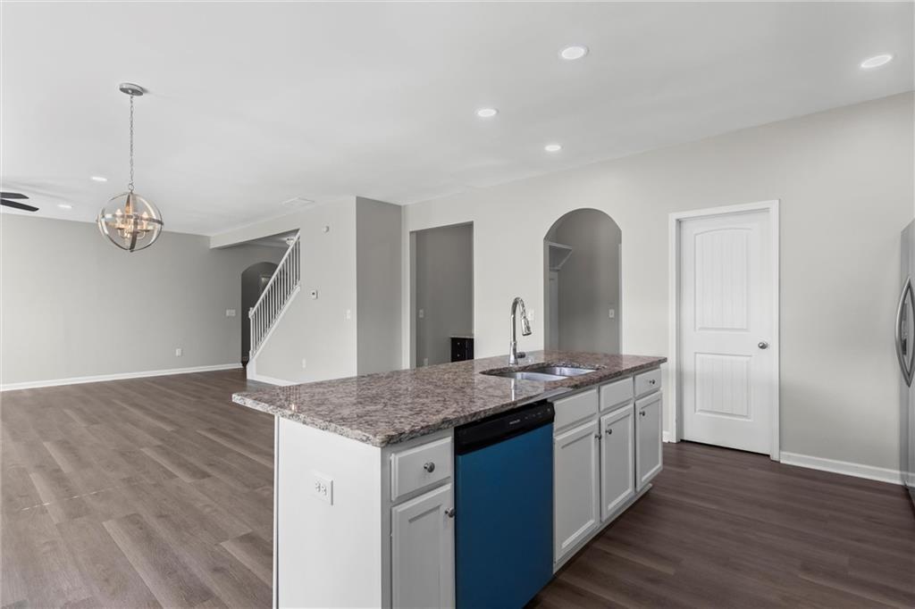 9120 Alden Drive Locust Grove, GA 30248 - Photo 22 of 39 a kitchen with a sink and a mirror