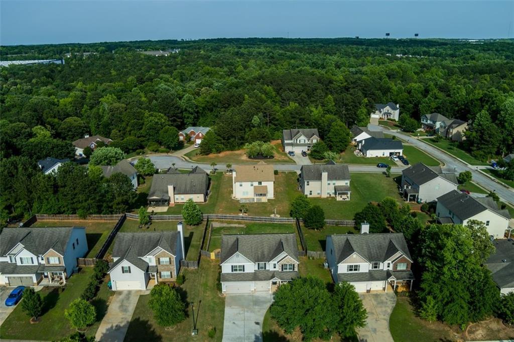 9120 Alden Drive Locust Grove, GA 30248 - Photo 3 of 39 an aerial view of multiple house
