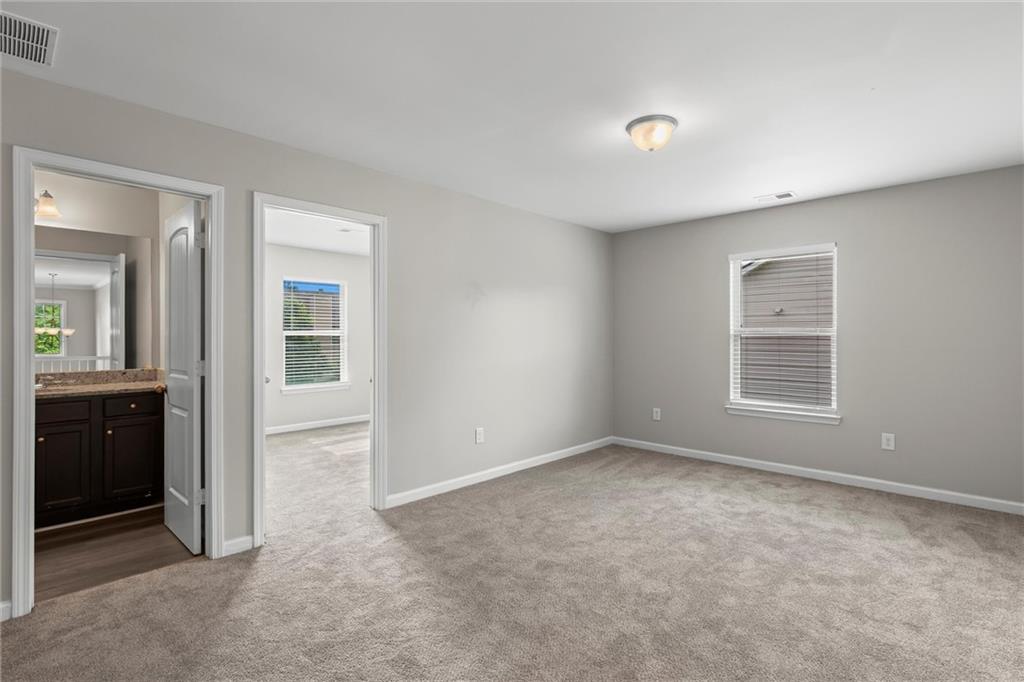 9120 Alden Drive Locust Grove, GA 30248 - Photo 33 of 39 a view of an empty room with a window