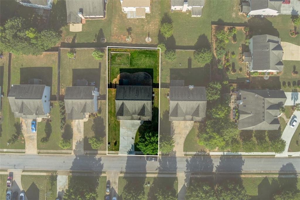 9120 Alden Drive Locust Grove, GA 30248 - Photo 5 of 39 a view of a glass door of a house