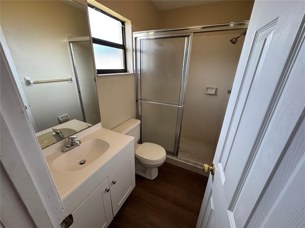 1786 Dagon Road Venice, FL 34293 - Photo 15 of 18 a bathroom with a toilet sink and shower
