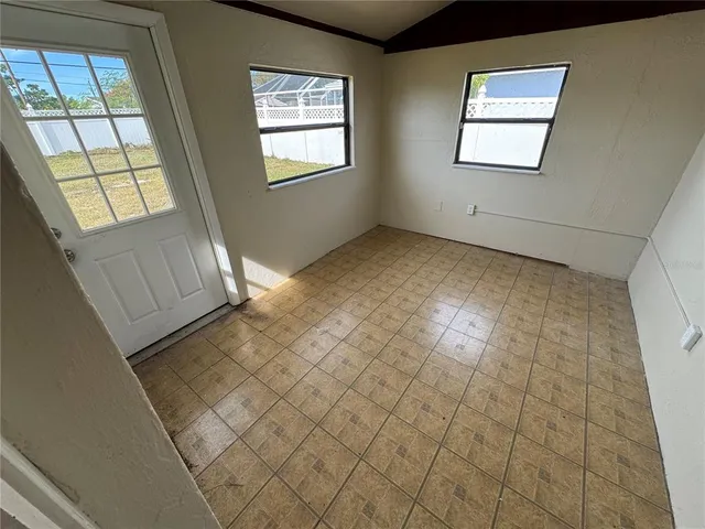 a view of an empty room and window
