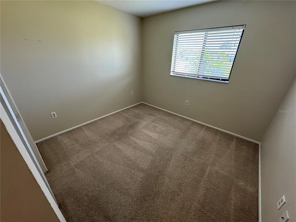 1786 Dagon Road Venice, FL 34293 - Photo 9 of 18 an empty room with a window